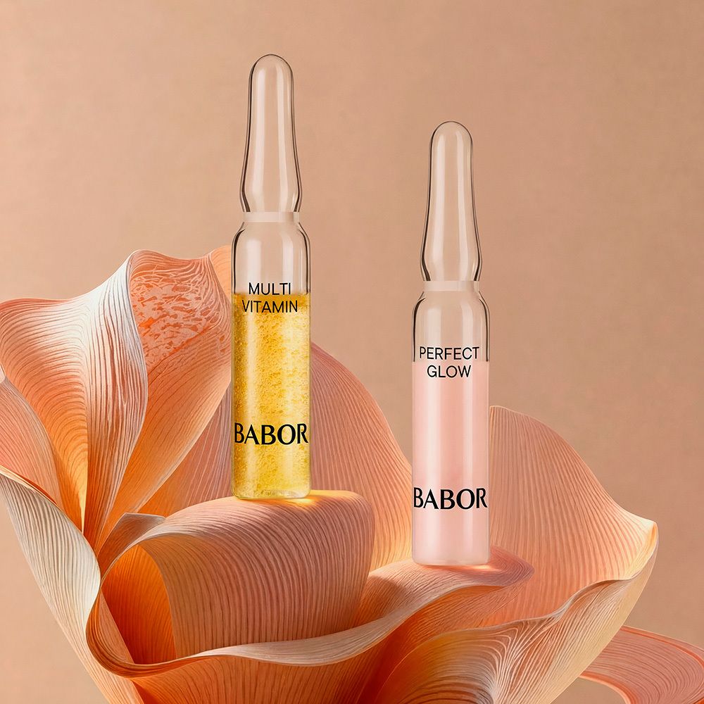 Babor Vitamin Glow Ampulle Serum Konzentrat Verpackung mit Blumenmotiv.