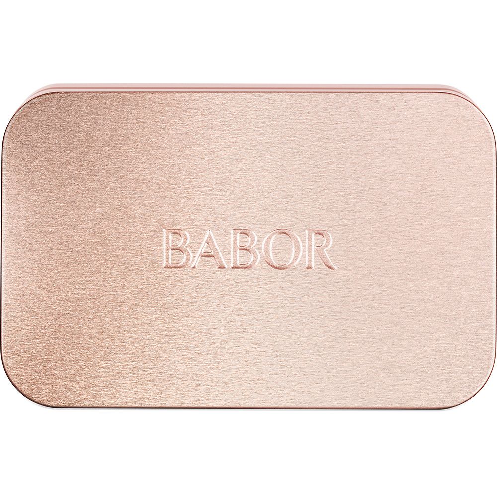 Geschlossene roségoldene Metalldose mit Babor-Prägung.