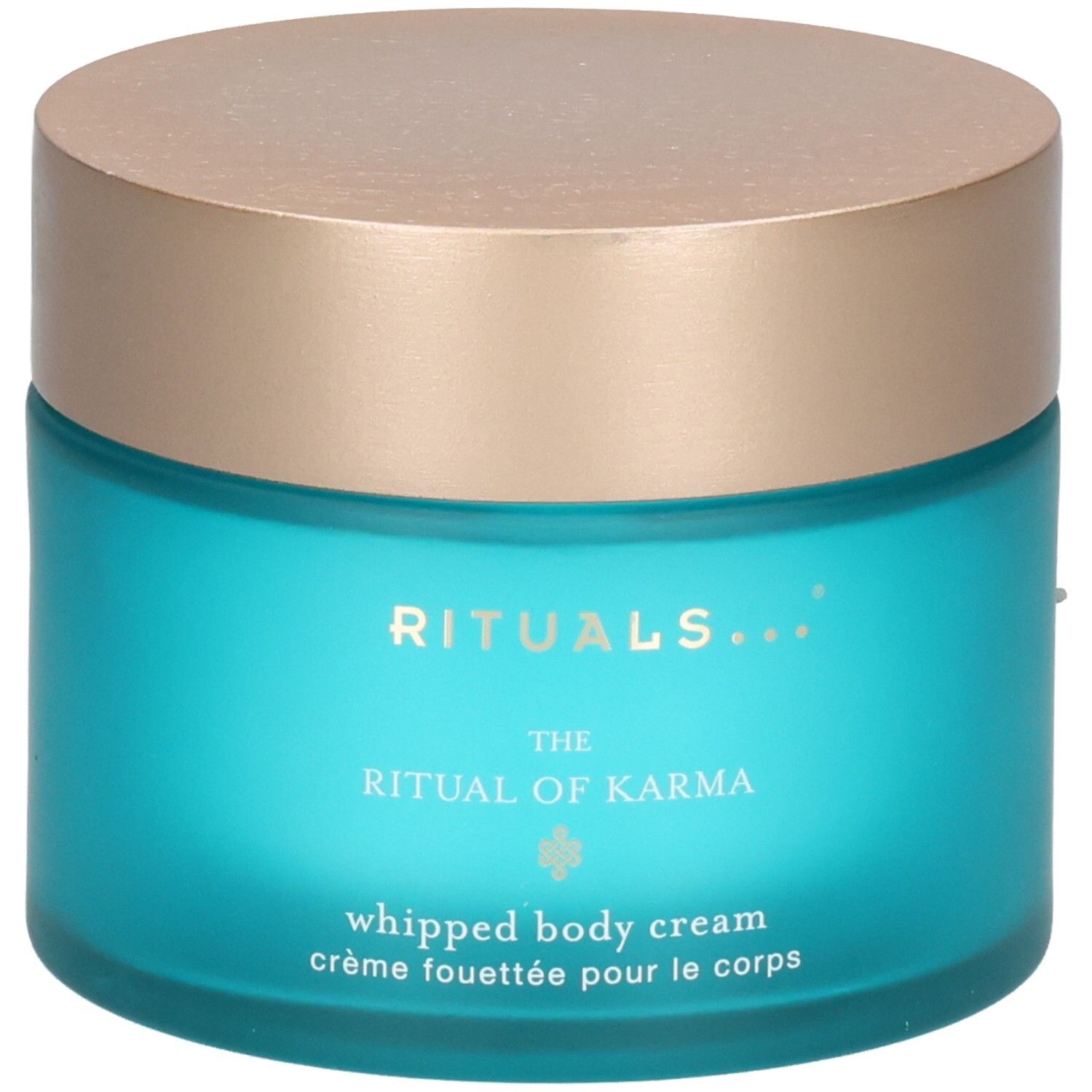 RITUALS The Ritual of Karma Crème Corps Fouettée dans un pot en verre bleu avec un couvercle doré.