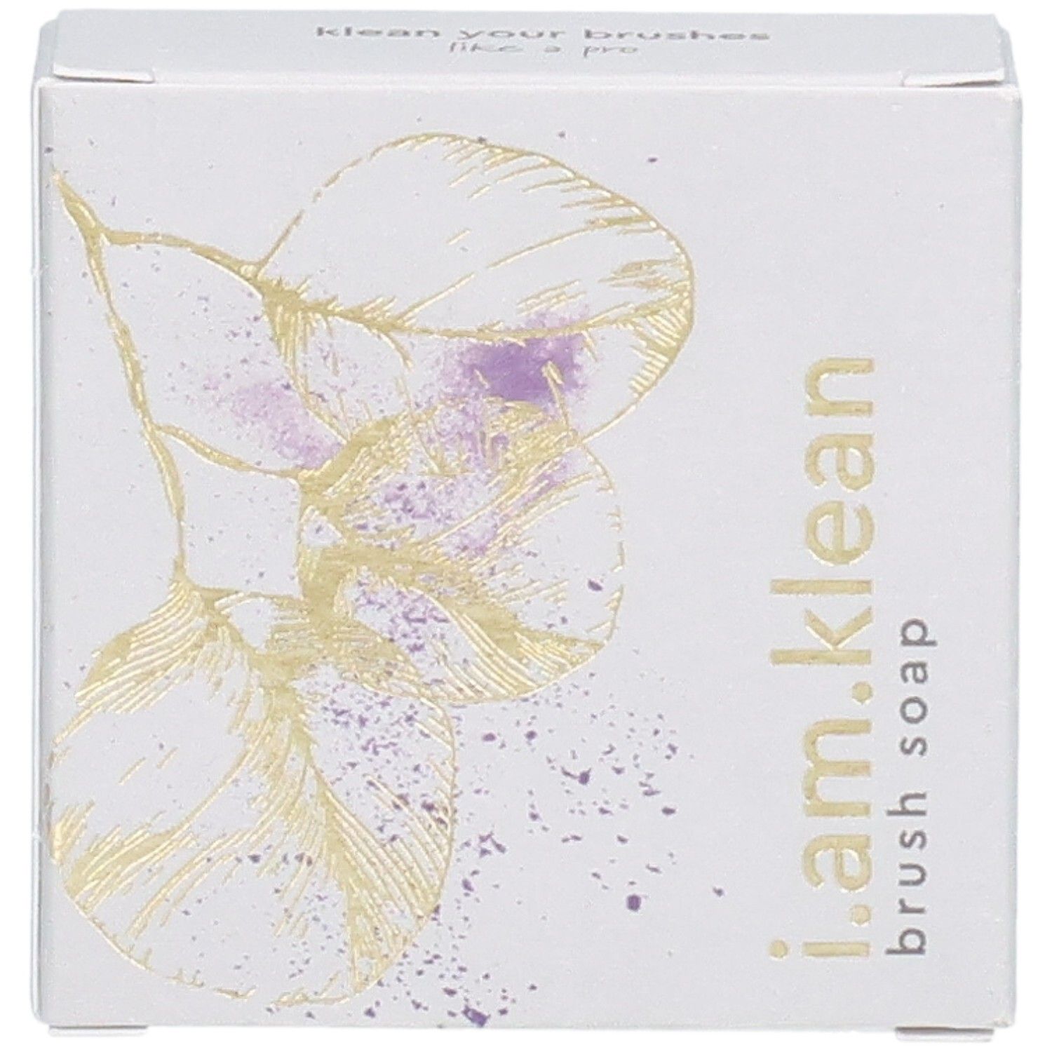 Kartonverpackung mit floralem Design und Produktnamen i.am.klean Brush Soap. Ansicht von oben.