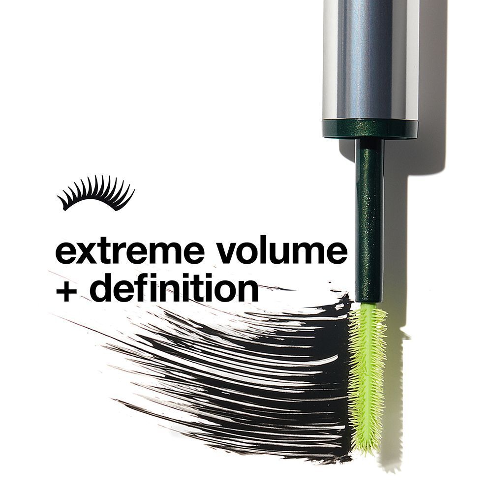 Brosse de mascara Clinique avec tête verte et traînée de mascara noir.