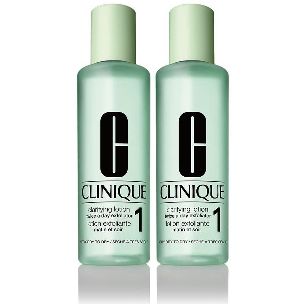 Deux flacons de Clinique Clarifying Lotion 1 avec bouchons vert pâle et logo Clinique.
