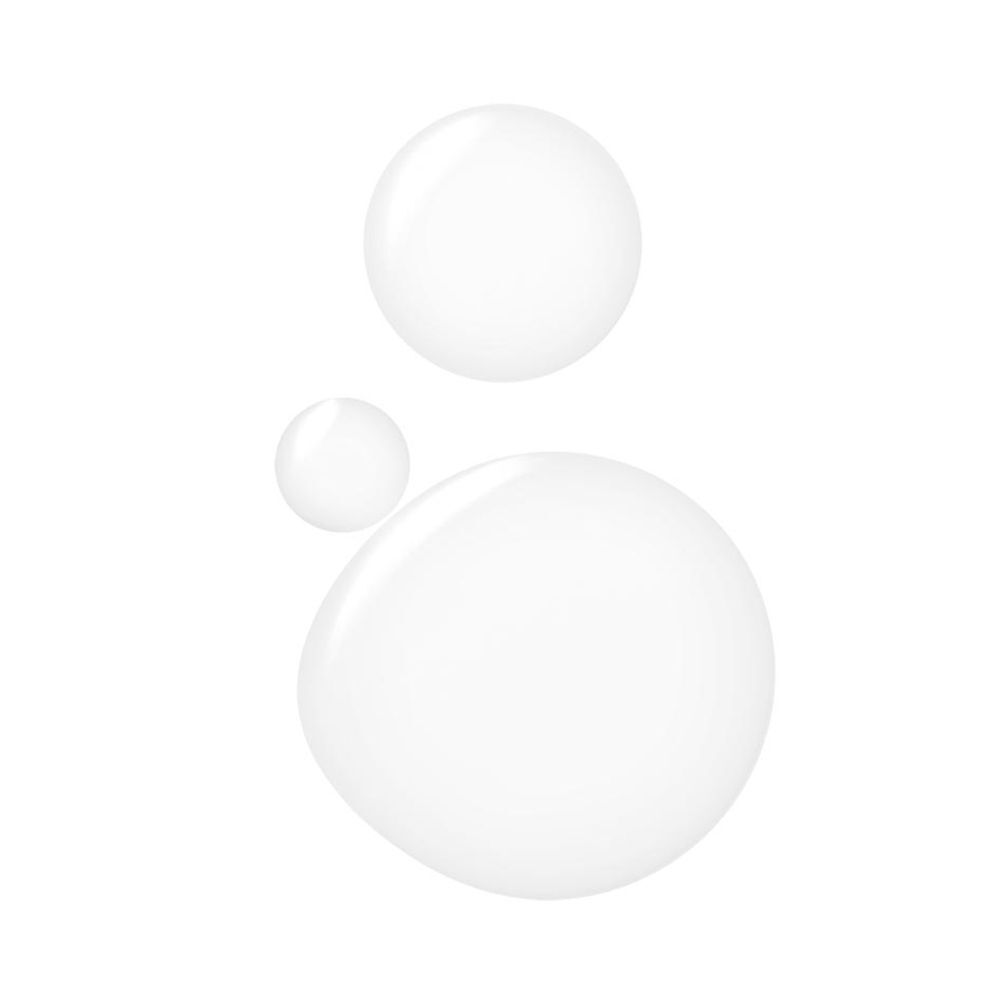 Trois gouttes d'un liquide blanc et clair sur fond blanc.