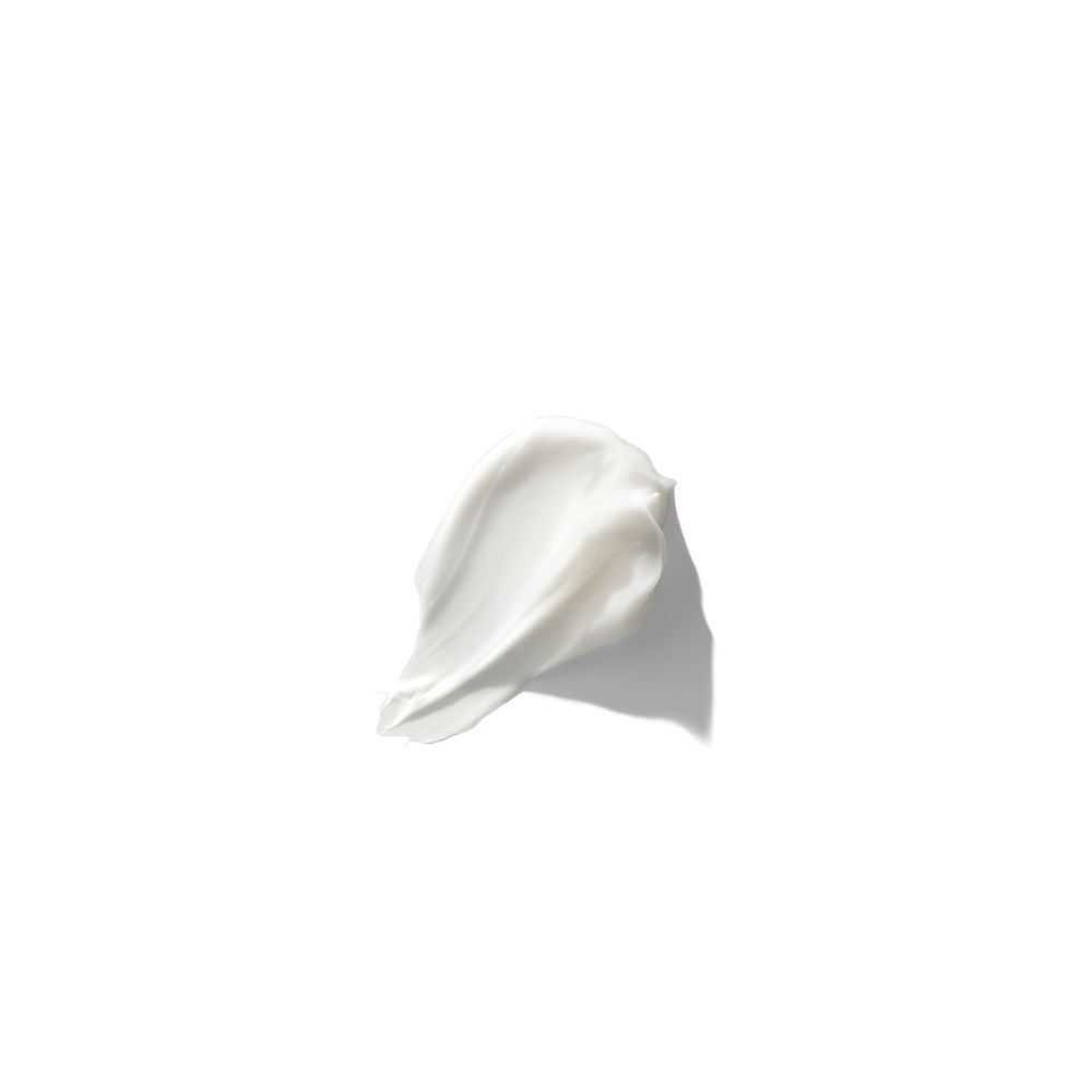 Eine weiße Creme-Spur auf weißem Hintergrund.