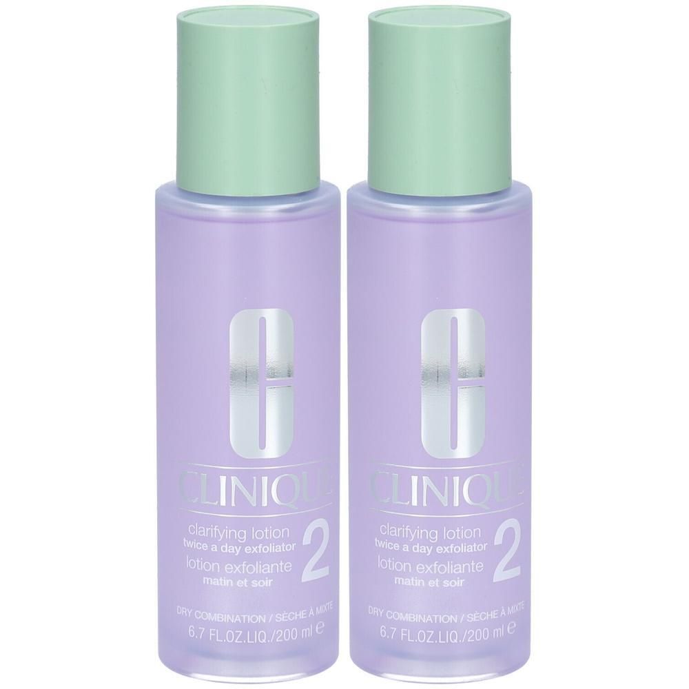 Zwei CLINIQUE Clarifying Lotion 2 Flaschen, lila transparent, mit hellgrünen Verschlüssen. Exfoliationslotion für trockene/Mischhaut.