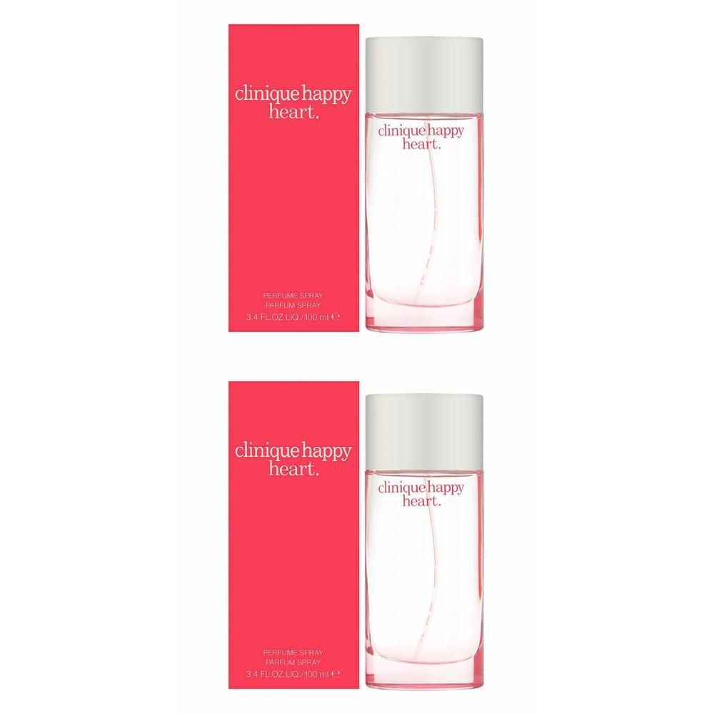 Deux flacons de Clinique Happy Heart Eau de Parfum avec boîtes rouges. Flacons en verre transparent avec bouchon blanc.