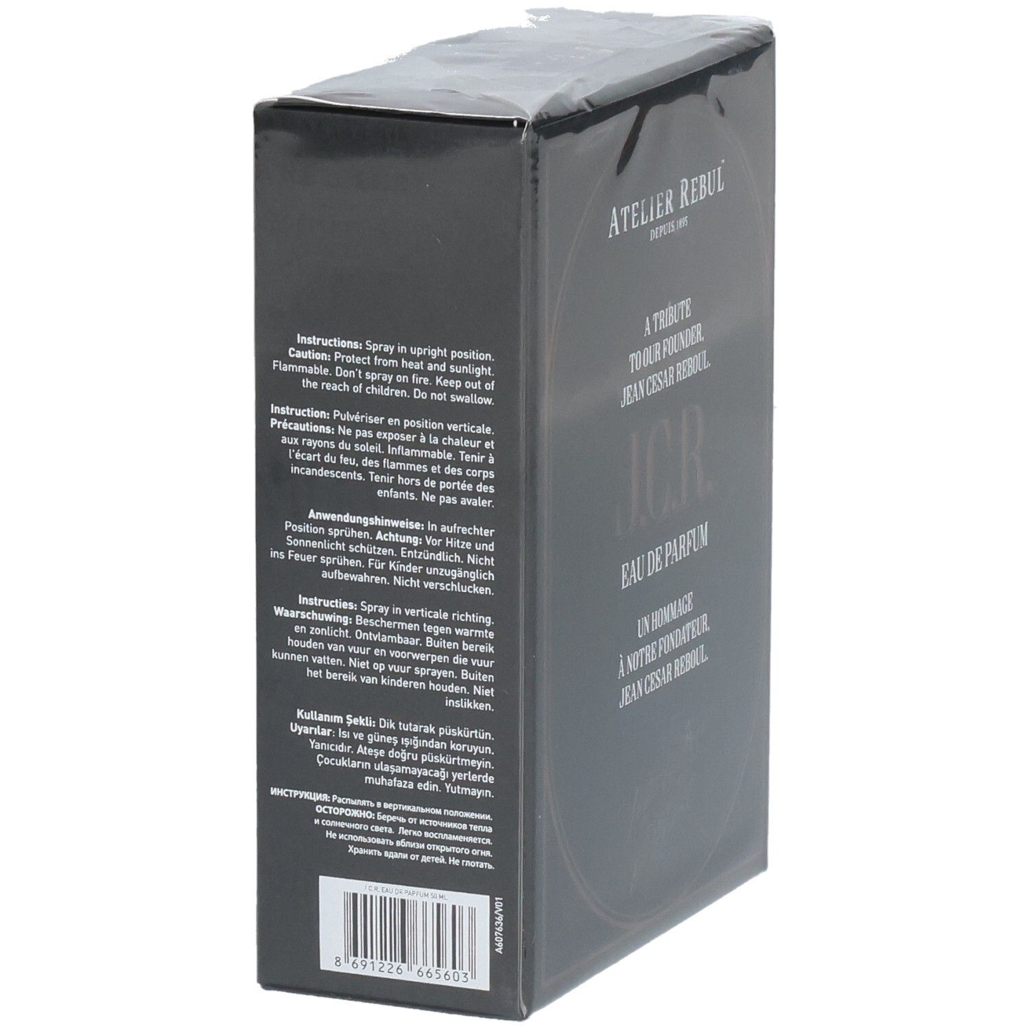 Schwarze Parfümverpackung mit Warnhinweisen und Anweisungen auf mehreren Sprachen.