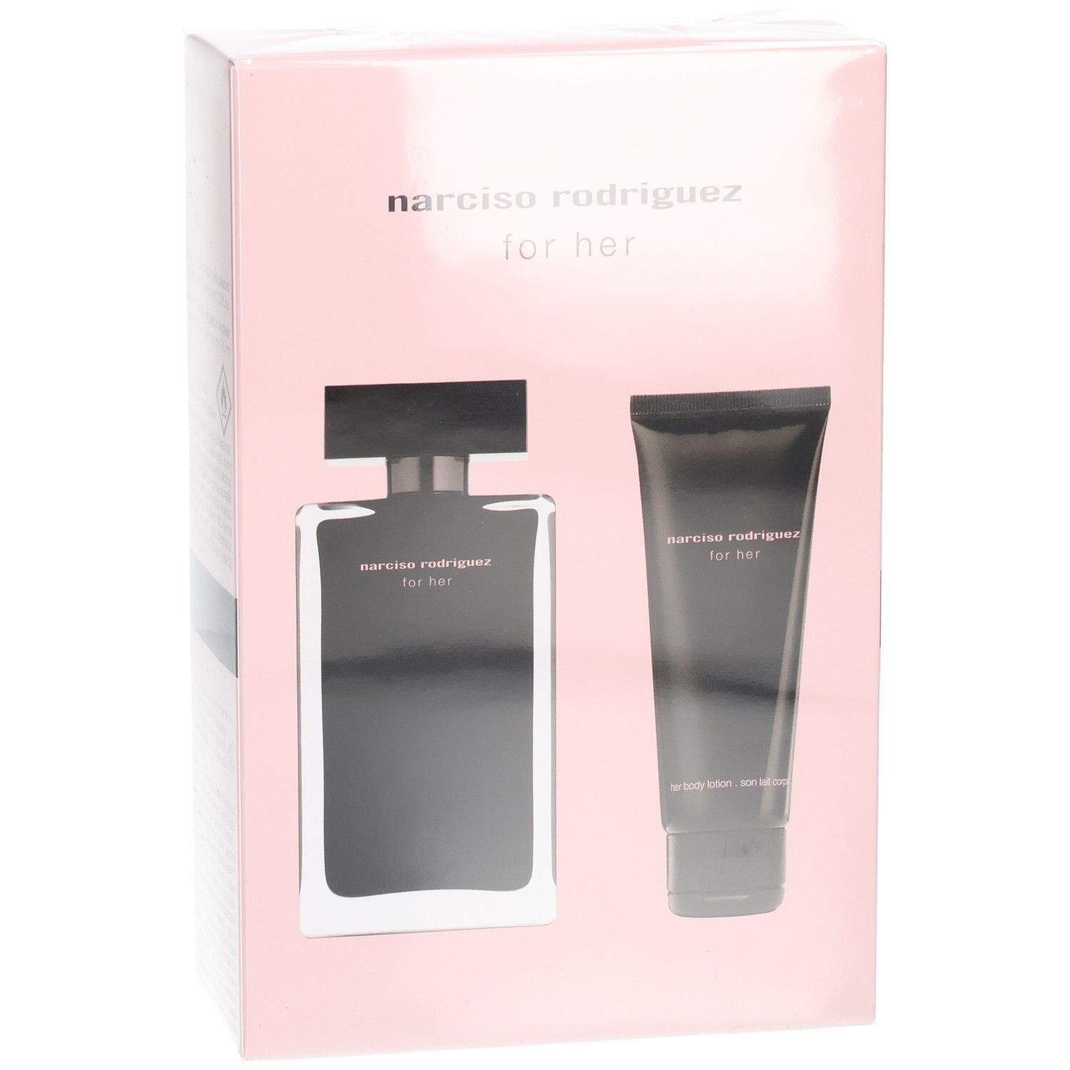 Narciso Rodriguez For Her Coffret: Eau de Toilette Flakon und Body Lotion Tube auf rosa Karton.