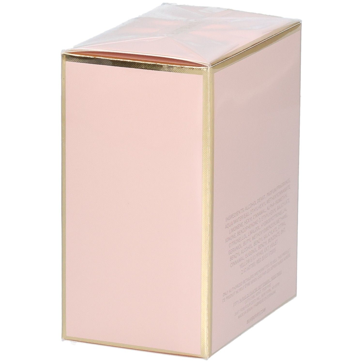 Eine zartrosa rechteckige Schachtel mit goldener Zierleiste und transparenter Folienverpackung.
