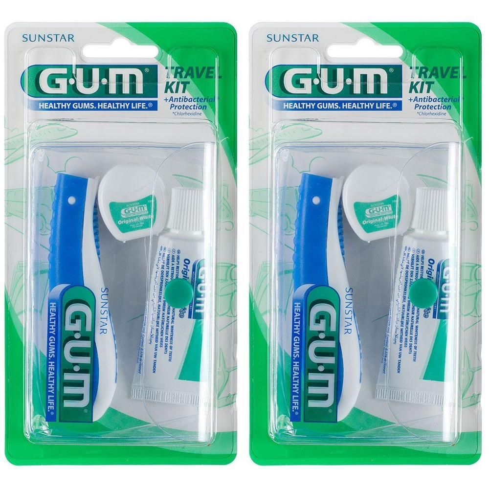 Zwei GUM Original White Reisekits mit Zahnbürste, Zahnpasta und Zahnseide in Blisterverpackung.