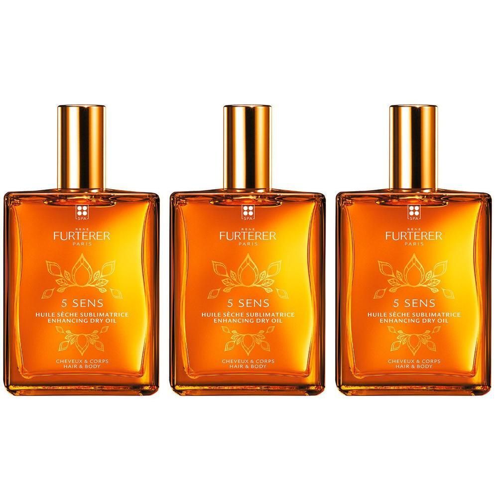 Drei Flaschen RENE FURTERER 5 SENS luxuriöses Trockenöl mit goldenen Verschlüssen.