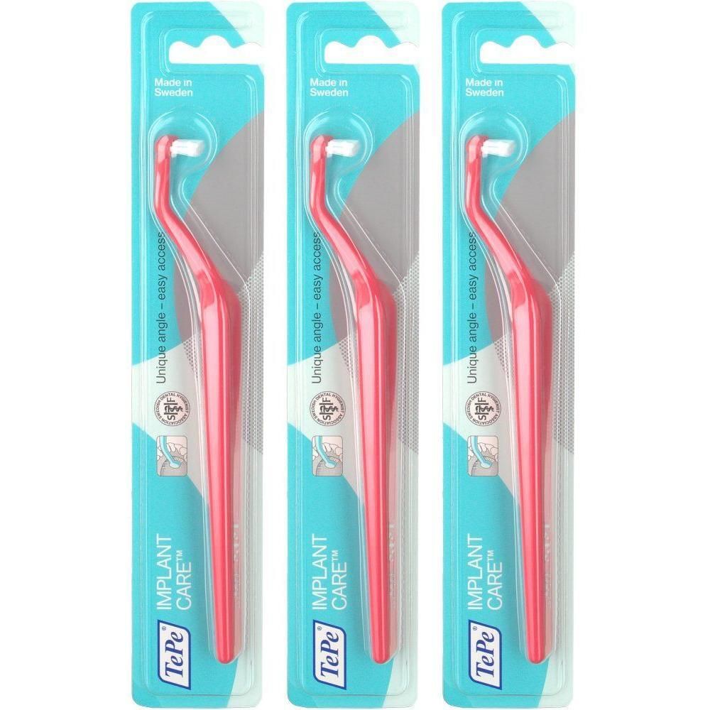 Drei TePe® IMPLANT CARE™ Einbüschelbürsten in Rot, verpackt in Blisterpackungen.