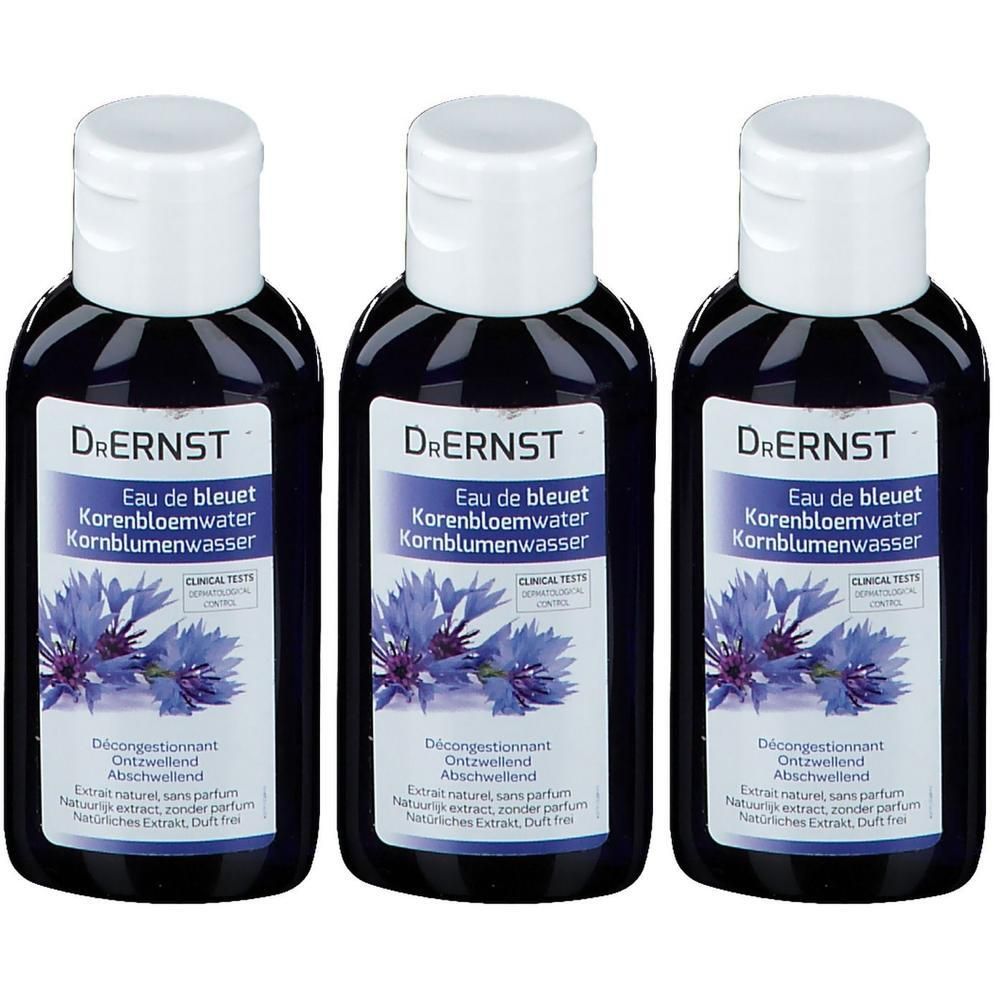 Trois flacons d'Eau de Bleuet Dr. Ernst avec bouchons blancs. Étiquettes bleues avec bleuets et texte.
