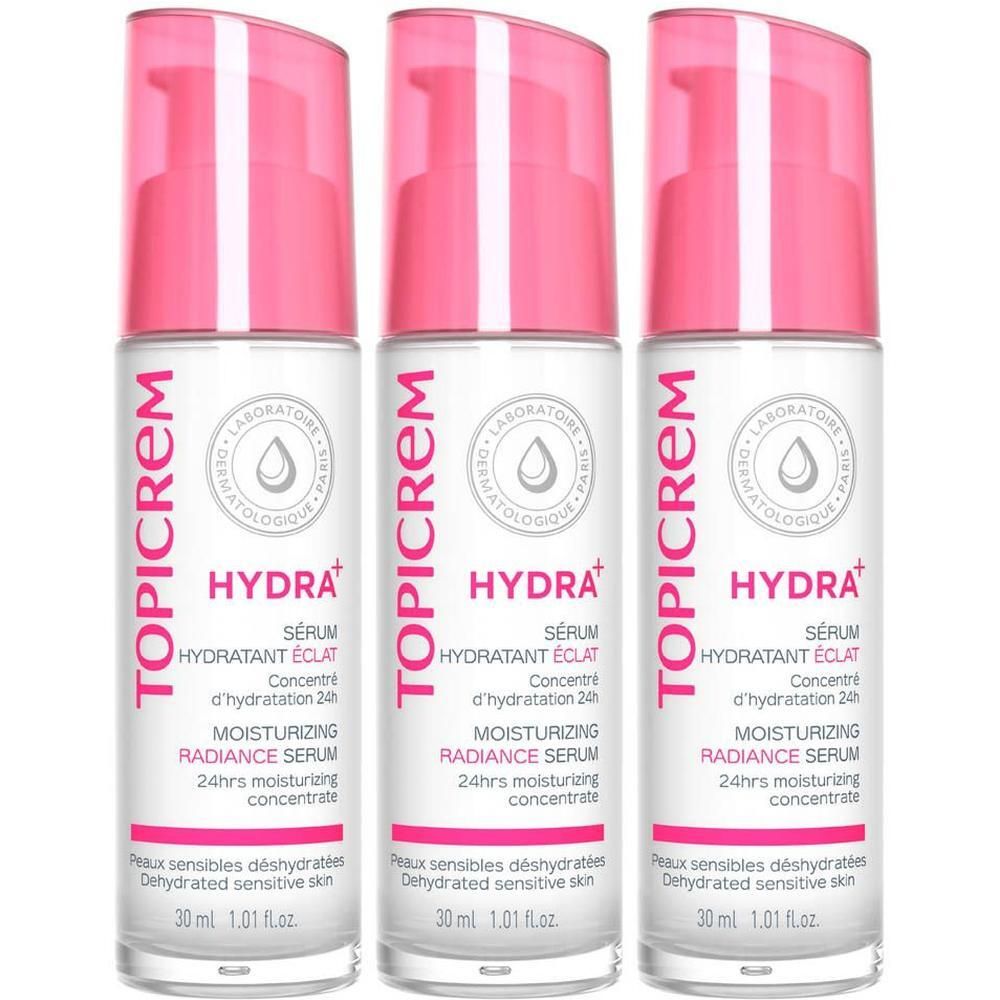 Trois flacons de sérum Topicrem Hydra+ avec des pompes roses.
