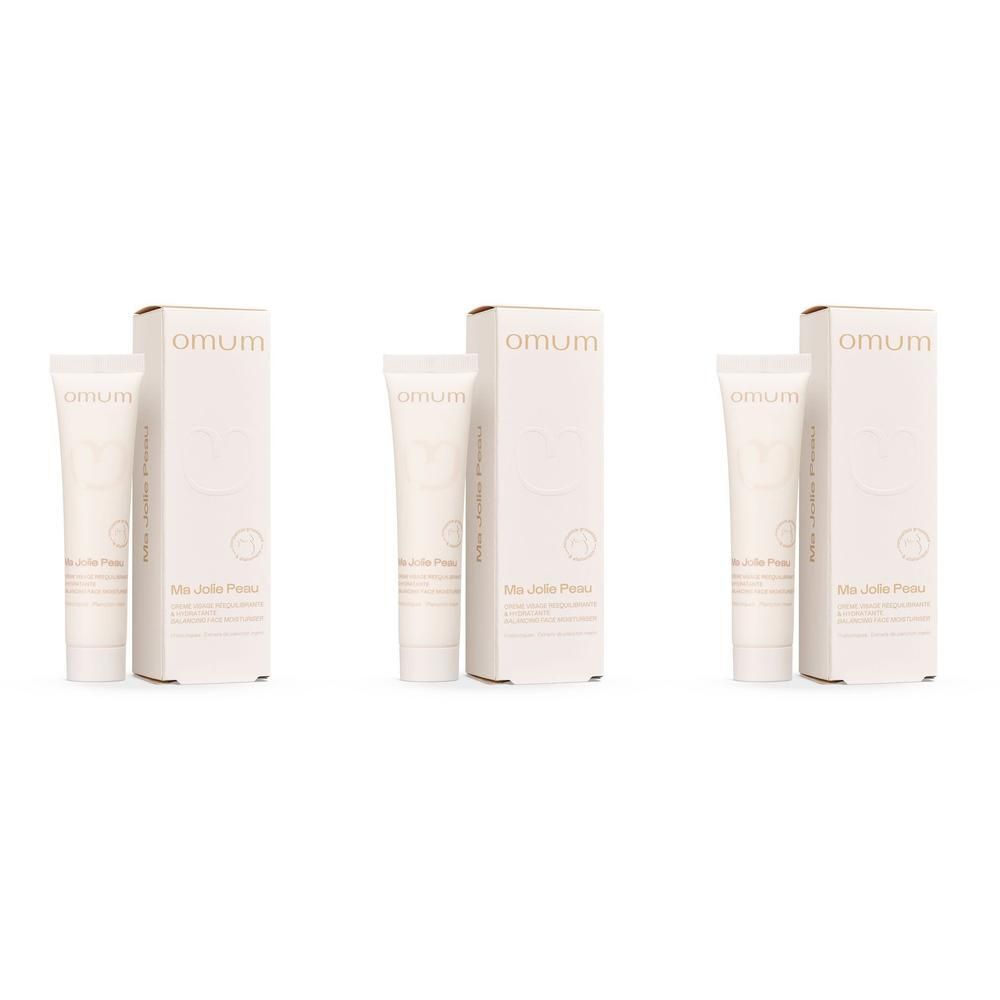 Trois tubes de crème visage Omum Ma Jolie Peau, décorés de motifs floraux et d'une silhouette de femme enceinte.