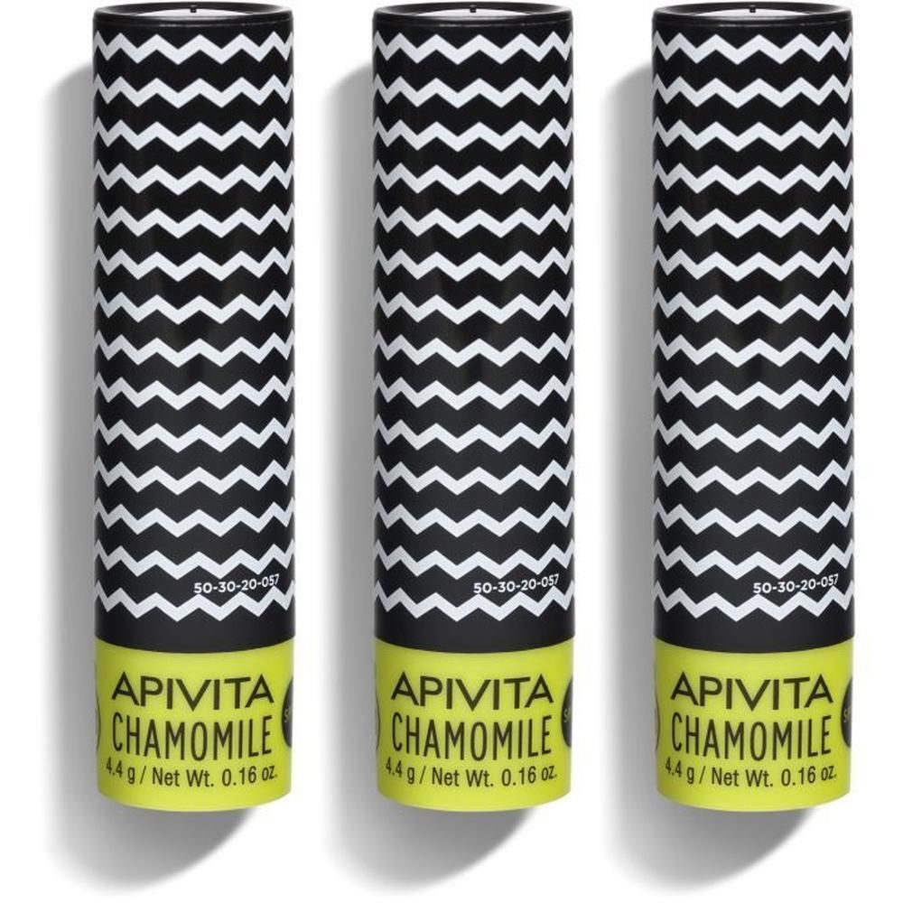 Drei Lippenbalsame mit schwarzem Zickzackmuster und gelbem Boden. Beschriftung: APIVITA CHAMOMILE.