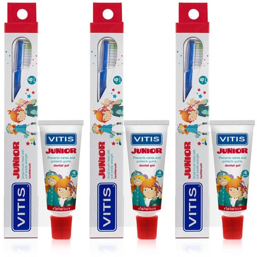 Trois coffrets de brosses à dents VITIS Junior avec dentifrice dans des emballages colorés illustrés pour enfants.