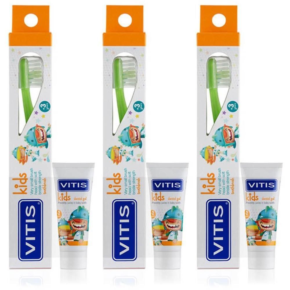 Trois coffrets de brosses à dents VITIS pour enfants, chacun avec une brosse verte et un tube de dentifrice dans un emballage orange.