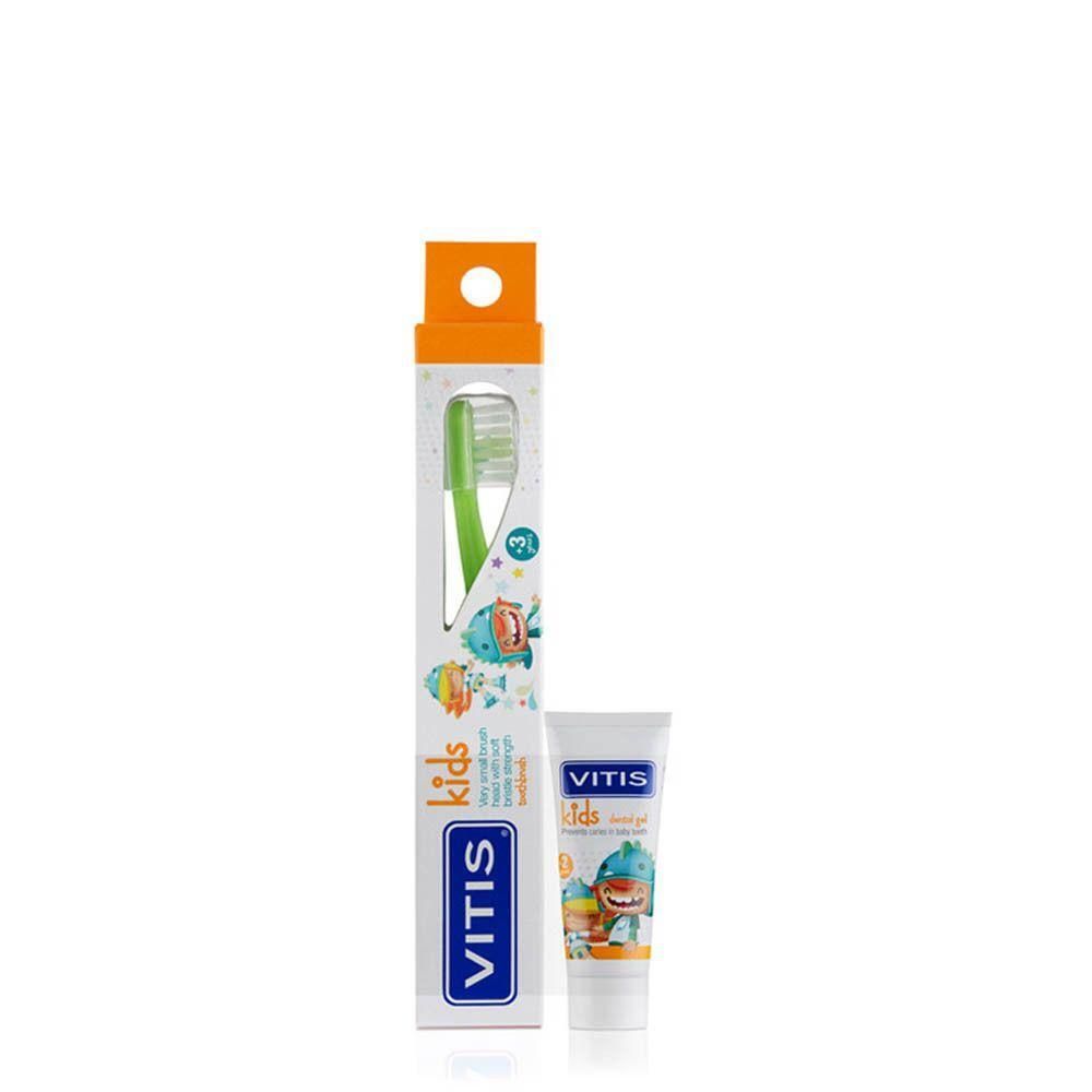 Brosse à dents VITIS pour enfants avec manche vert et tube de dentifrice assorti, emballé dans une boîte.