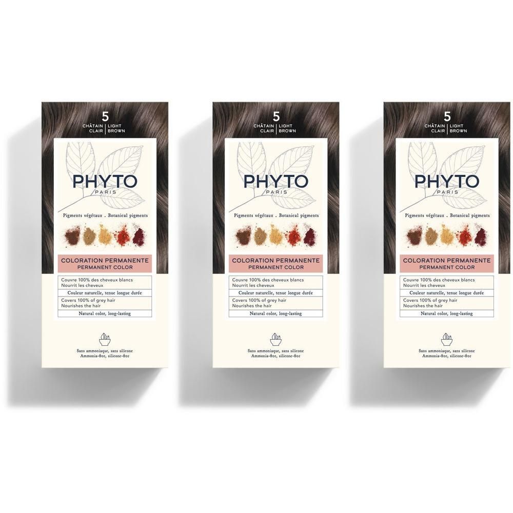 Trois boîtes de coloration permanente PHYTOCOLOR, teinte 5 Châtain Clair. L'emballage présente des illustrations botaniques et des échantillons de couleur.
