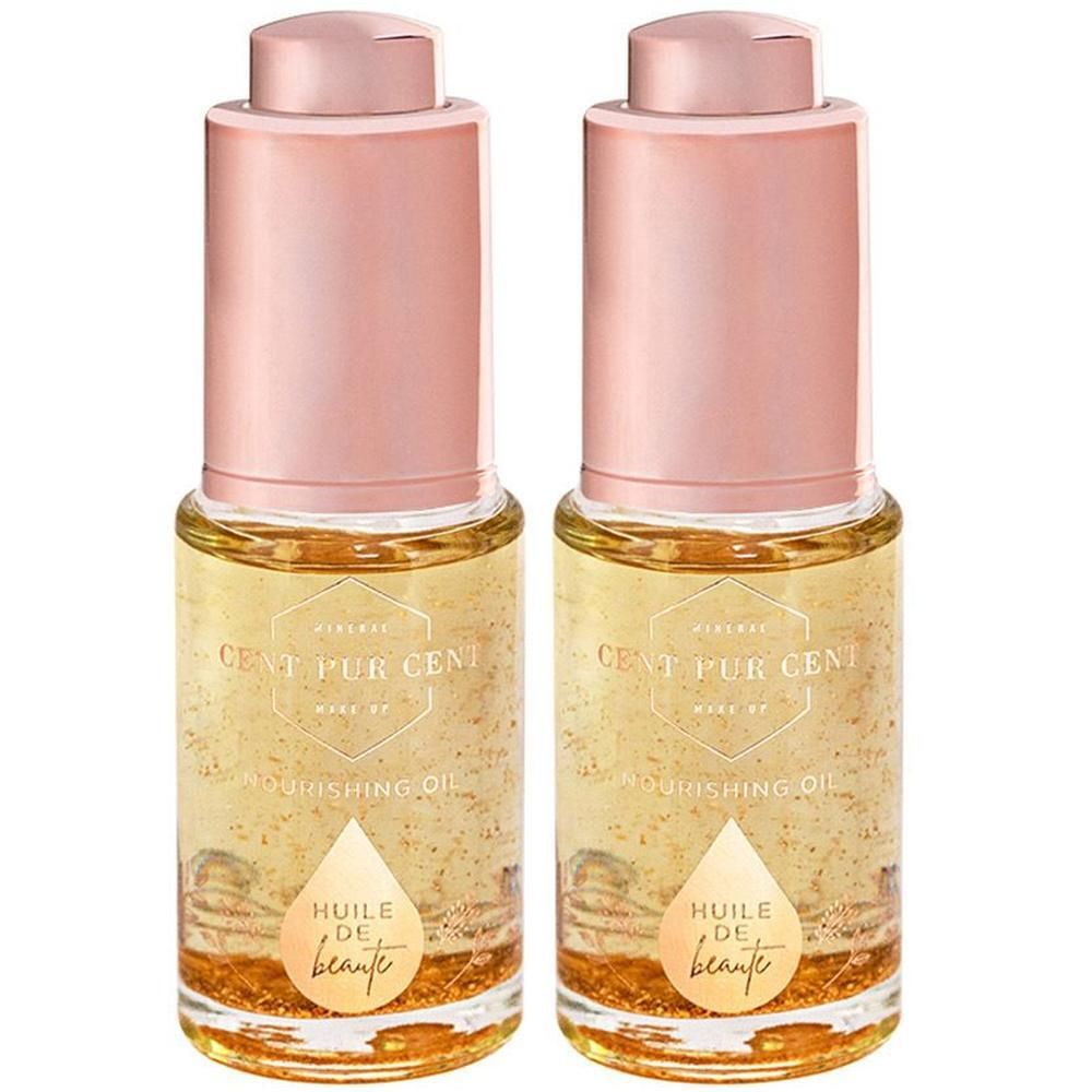 Deux flacons d'huile de beauté avec particules dorées et bouchon pipette.