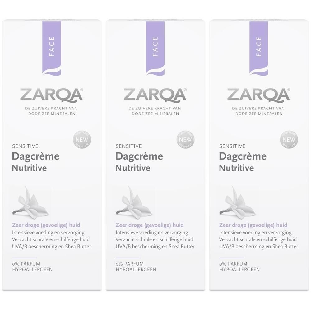 Trois paquets de crème de jour nourrissante ZARQA Sensitive avec fleur bleue et texte. Hypoallergénique.