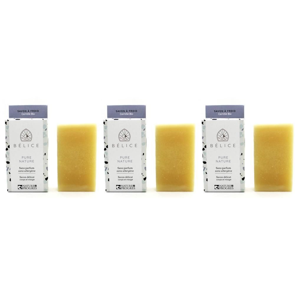 Trois savons Bélice Pure Nature non parfumés de couleur jaune, chacun dans son emballage.