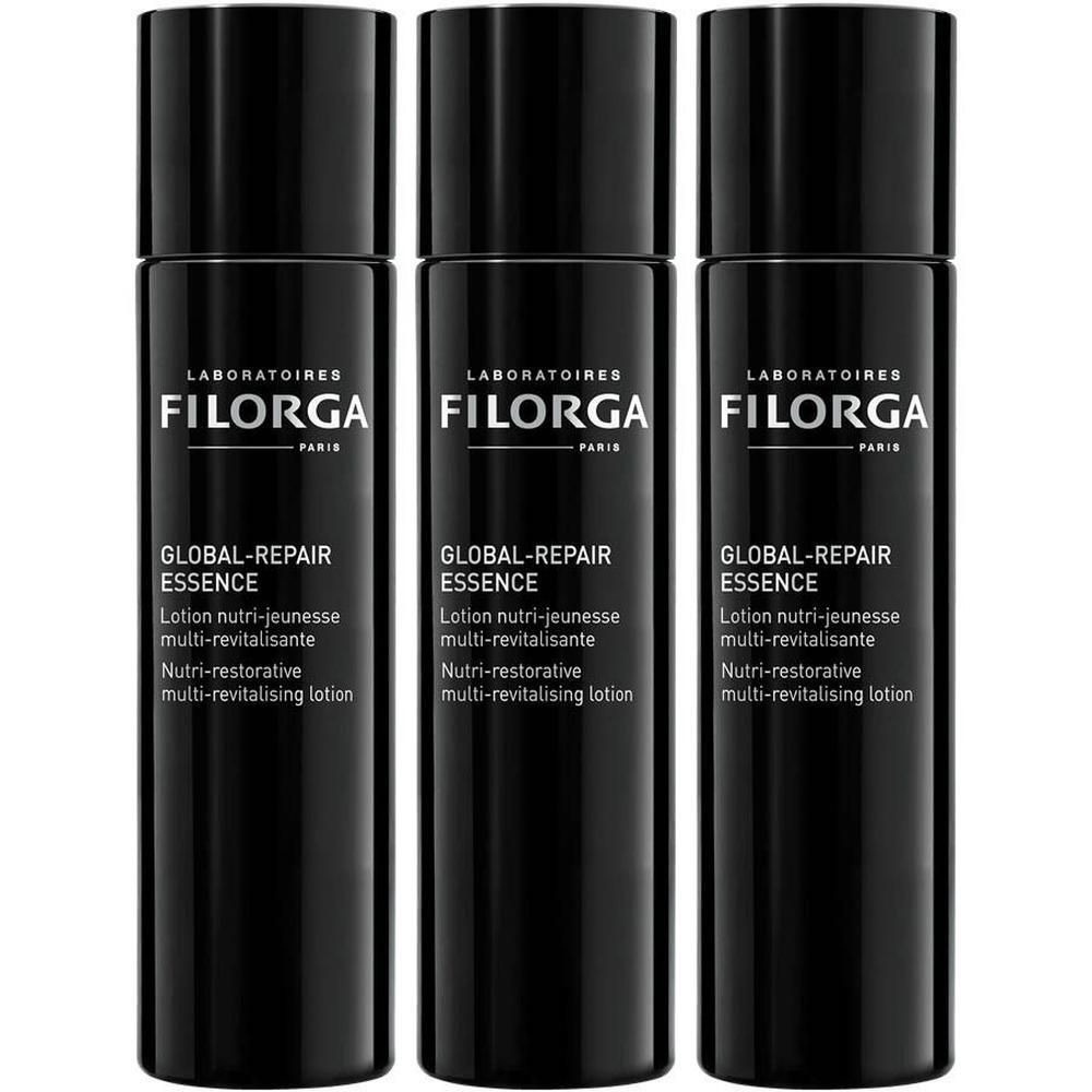 Drei schwarze Flaschen FILORGA Global-Repair Essenz mit silberner Beschriftung.