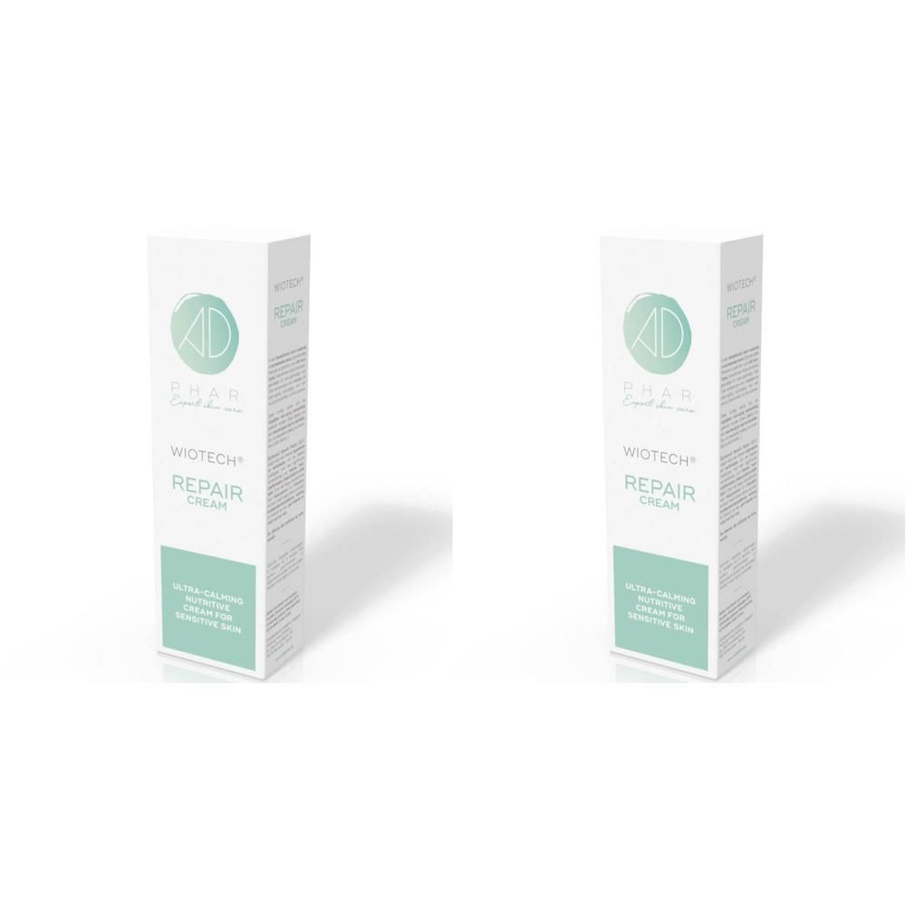 Deux boîtes de crème réparatrice Wiotech, blanches avec des accents verts. Texte : Wiotech Repair Cream.