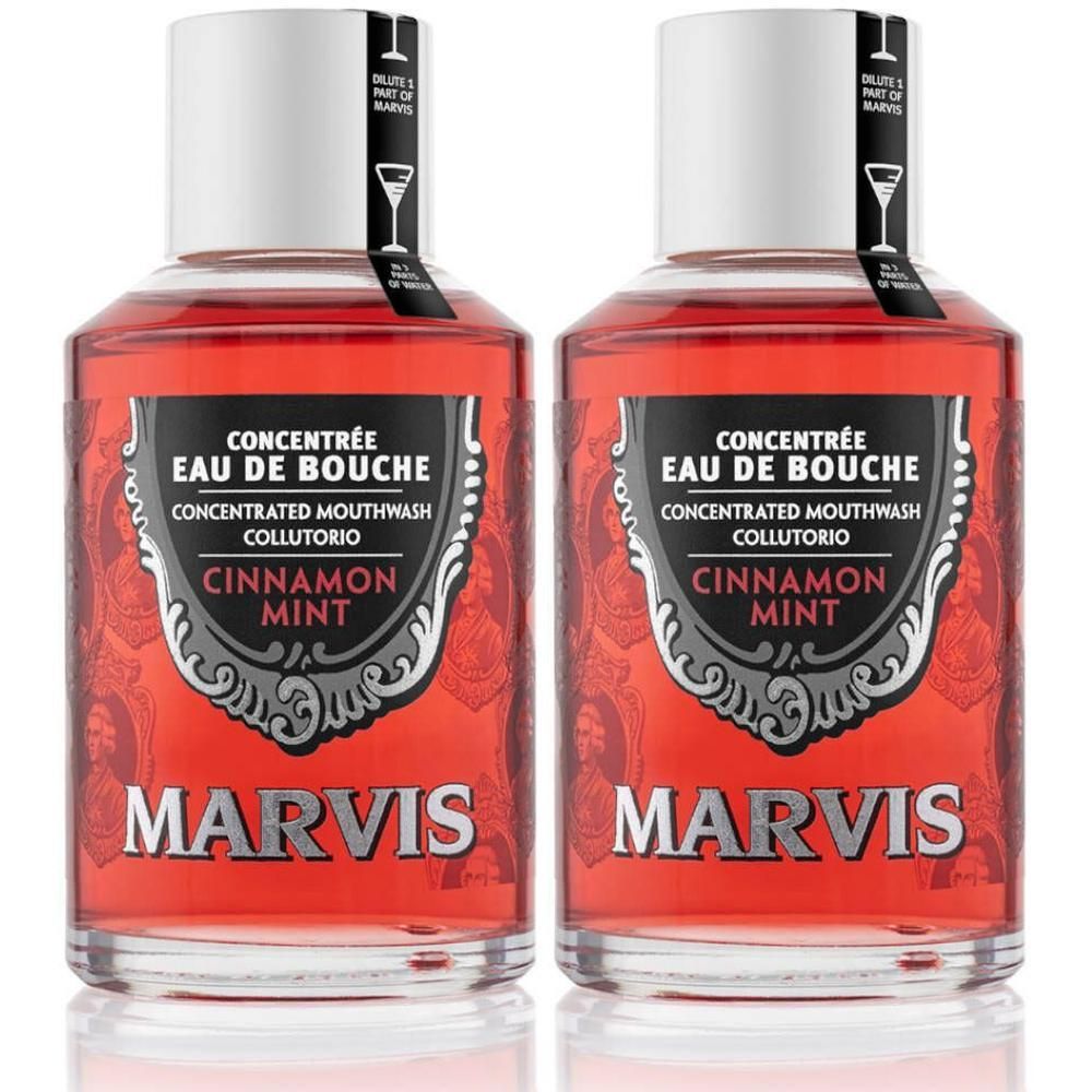Zwei Flaschen Marvis Mundwasserkonzentrat Zimt-Minze mit roter Flüssigkeit und silberner Schrift.