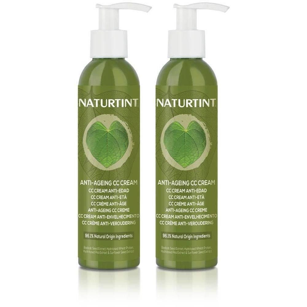 Deux flacons pompe verts NATURTINT CC Crème Anti-Âge avec motif de feuille.