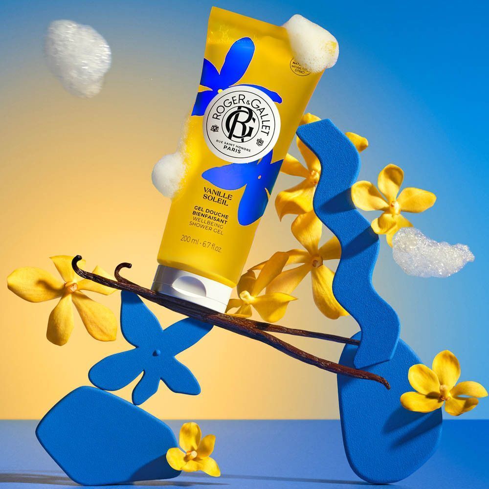 Gelbe Tube Roger&Gallet Vanille Soleil Duschgel mit blauen Blumen, 200 ml.