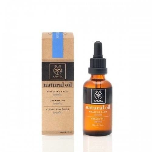 Braune Glasflasche mit Pipette und Kartonverpackung. Aufschrift: Apivita Natural Oil, Jojoba.