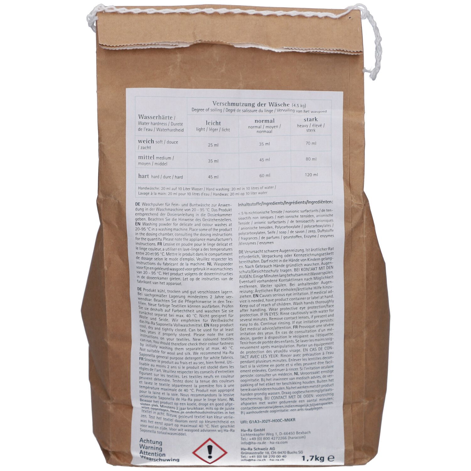 Rückseite einer braunen Papiertüte. Text in Deutsch, Französisch, Italienisch und Niederländisch. Enthält Dosierungstabellen und Warnhinweise.