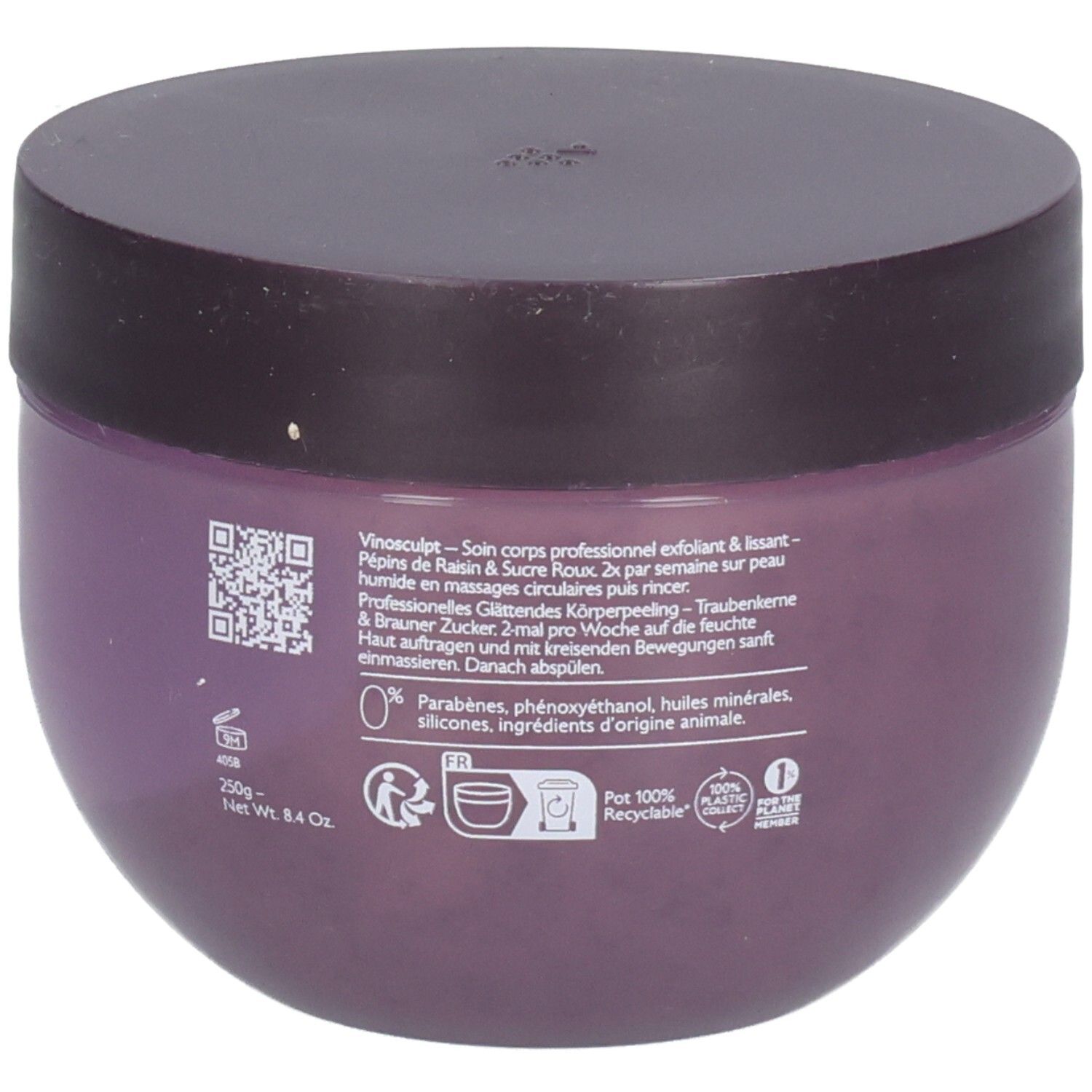 Pot rond avec couvercle. Dos avec texte et symboles. Inscription: Caudalie, Vinosculpt, Crushed Cabernet Peeling.