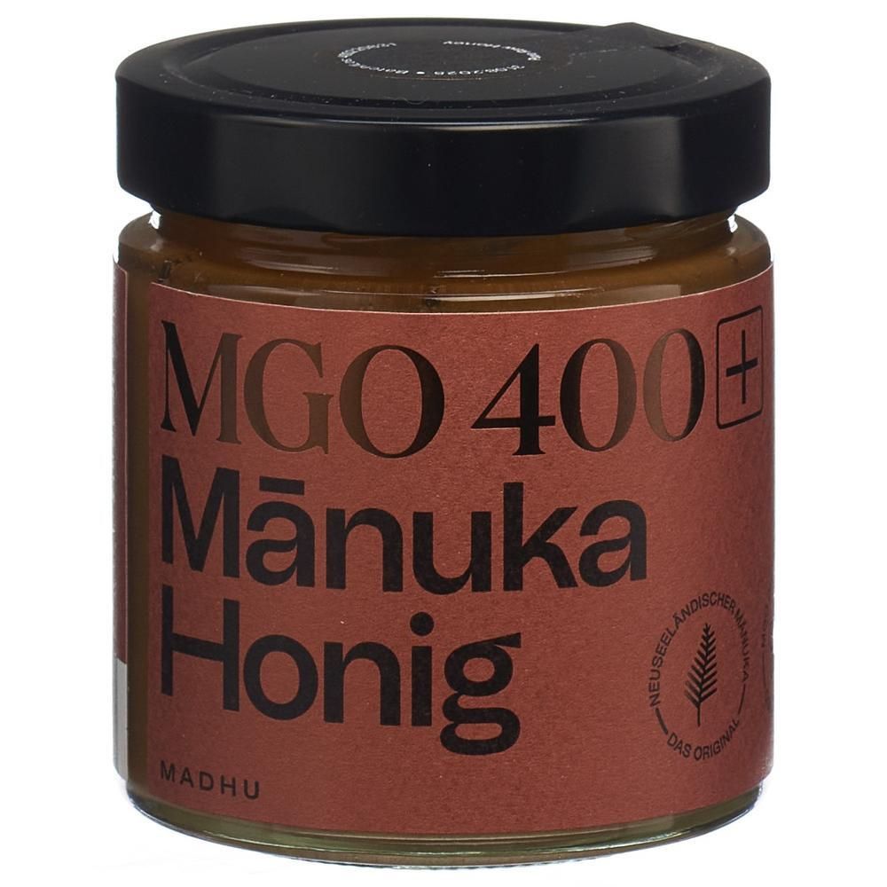 Glas Manuka Honig MGO 400+ mit schwarzem Deckel und braunem Etikett.