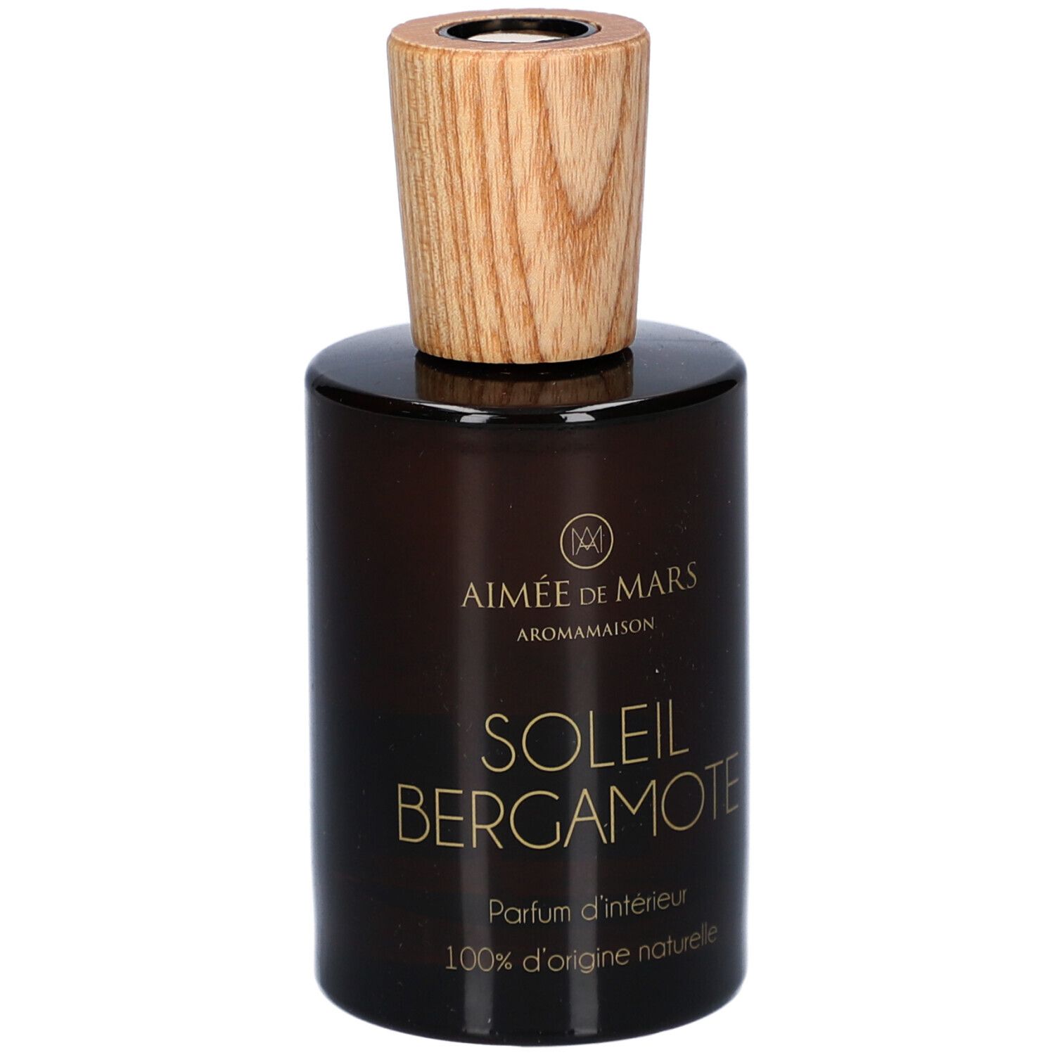 Flacon en verre brun avec bouchon en bois. Inscription : AIMEE DE MARS, SOLEIL BERGAMOTE, Parfum d'intérieur, 100% d'origine naturelle.