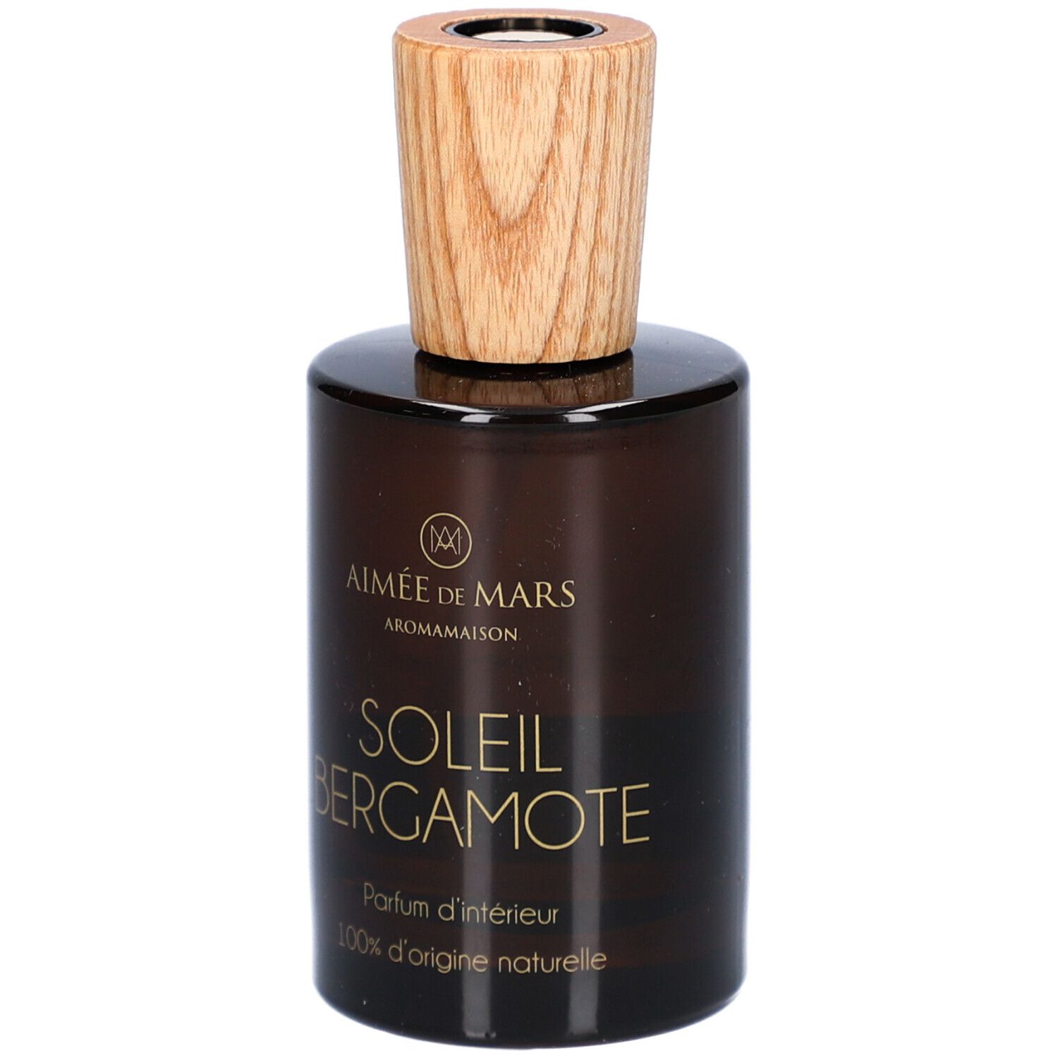 Flacon en verre brun avec bouchon en bois. Inscription : AIMEE DE MARS, SOLEIL BERGAMOTE, Parfum d'intérieur, 100% d'origine naturelle.