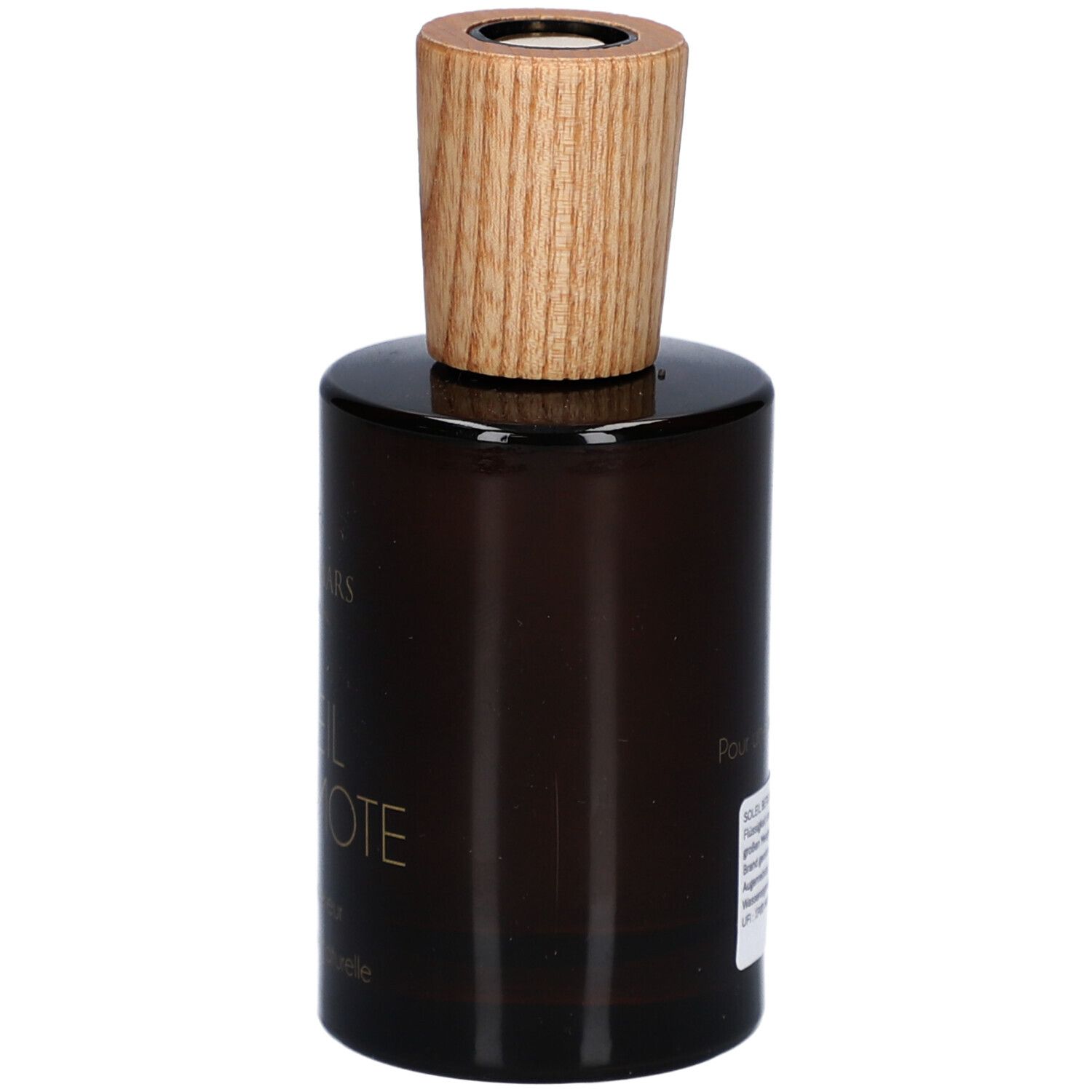 Flacon en verre brun avec bouchon en bois. Étiquette au dos avec texte. Nom du produit illisible.