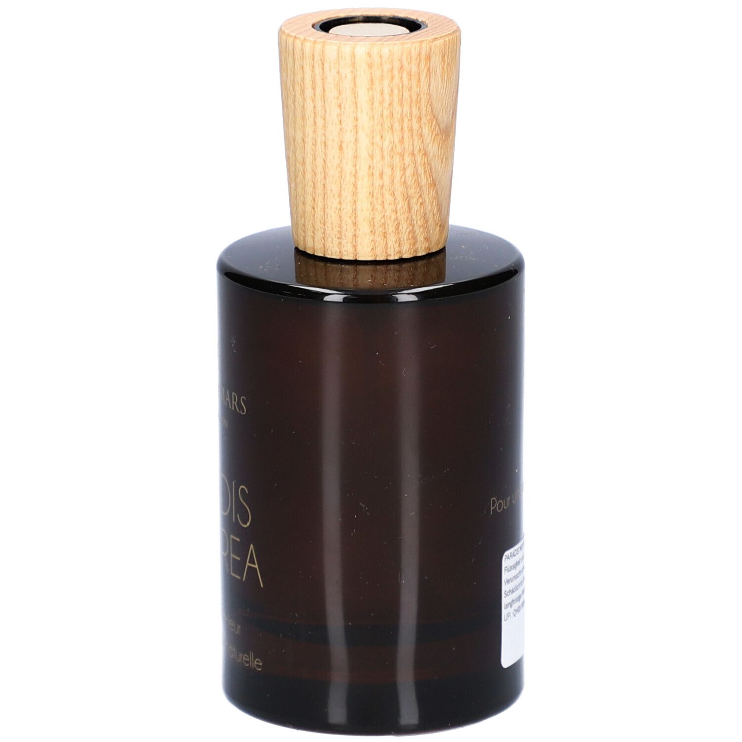 Braune Glasflasche mit Holzverschluss. Aufschrift: Paradis Moorea, Parfum d'intérieur, 100% d'origine naturelle. Marke: Aimée de Mars.
