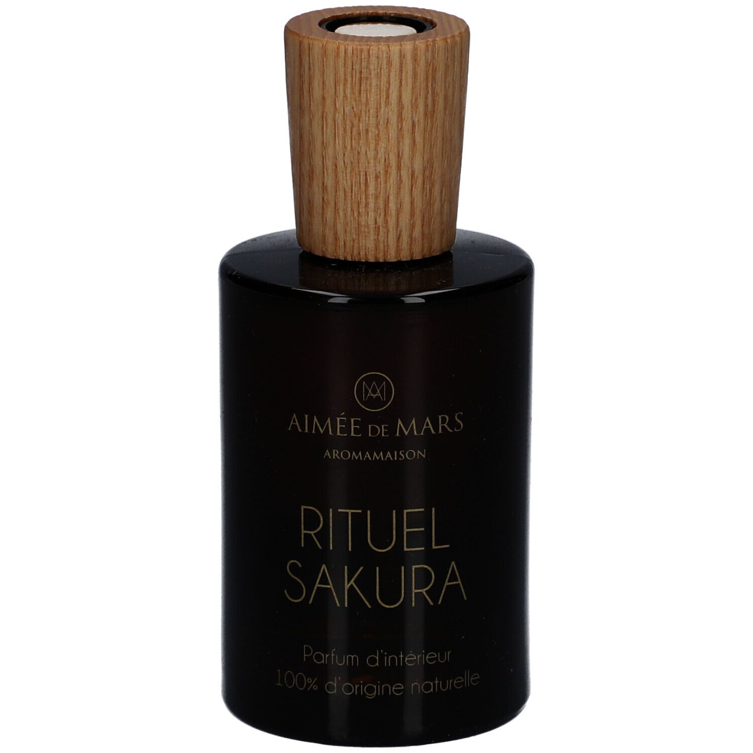 Braune Glasflasche mit Holzdeckel. Aufschrift: Rituel Sakura, Parfum d'intérieur, 100% d'origine naturelle. Marke: Aimée de Mars.