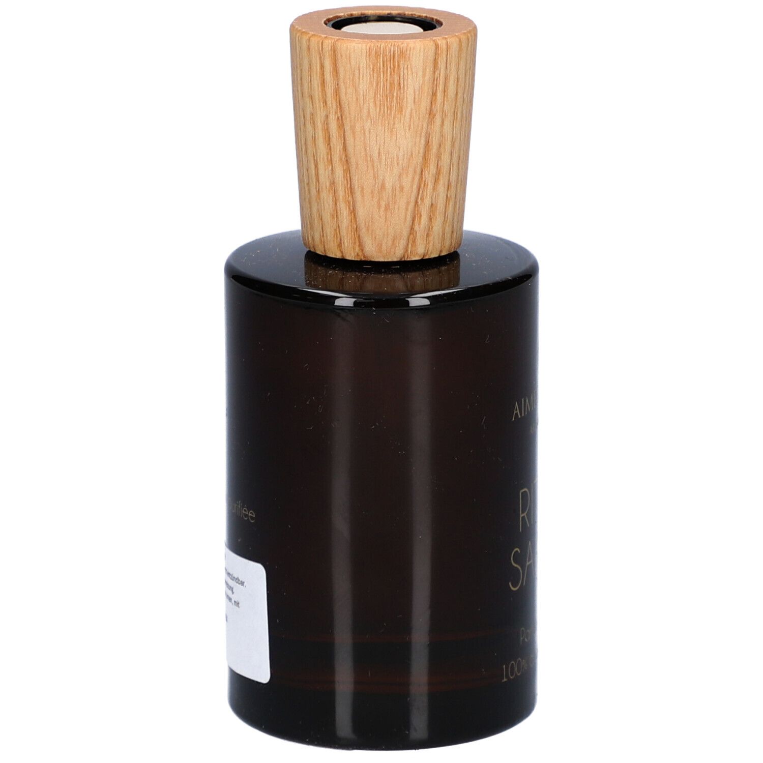 Braune Glasflasche mit Holzdeckel. Auf der Seite ein Etikett mit Text. Marke: Aimée de Mars.