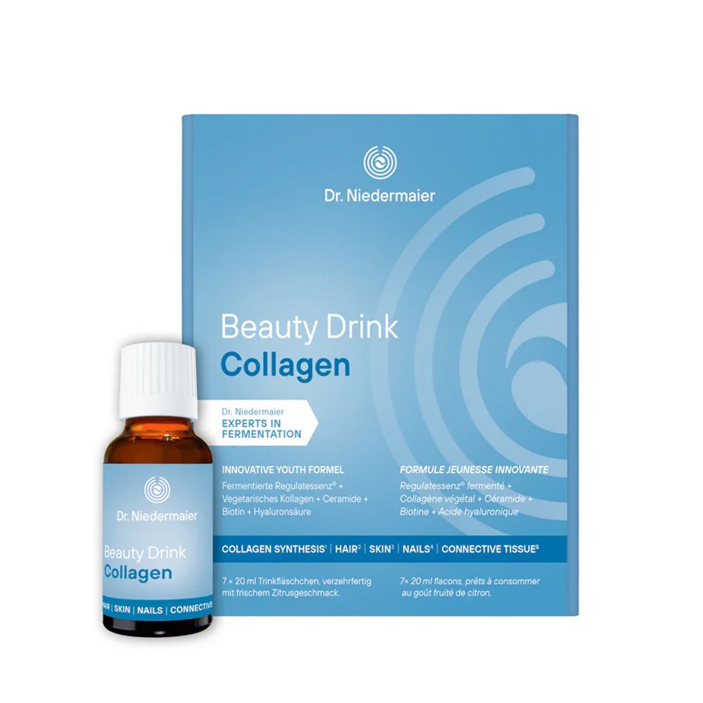Flacon en verre brun et emballage bleu. Inscription: Beauty Drink Collagen. Contient de l'acide hyaluronique et de la biotine.