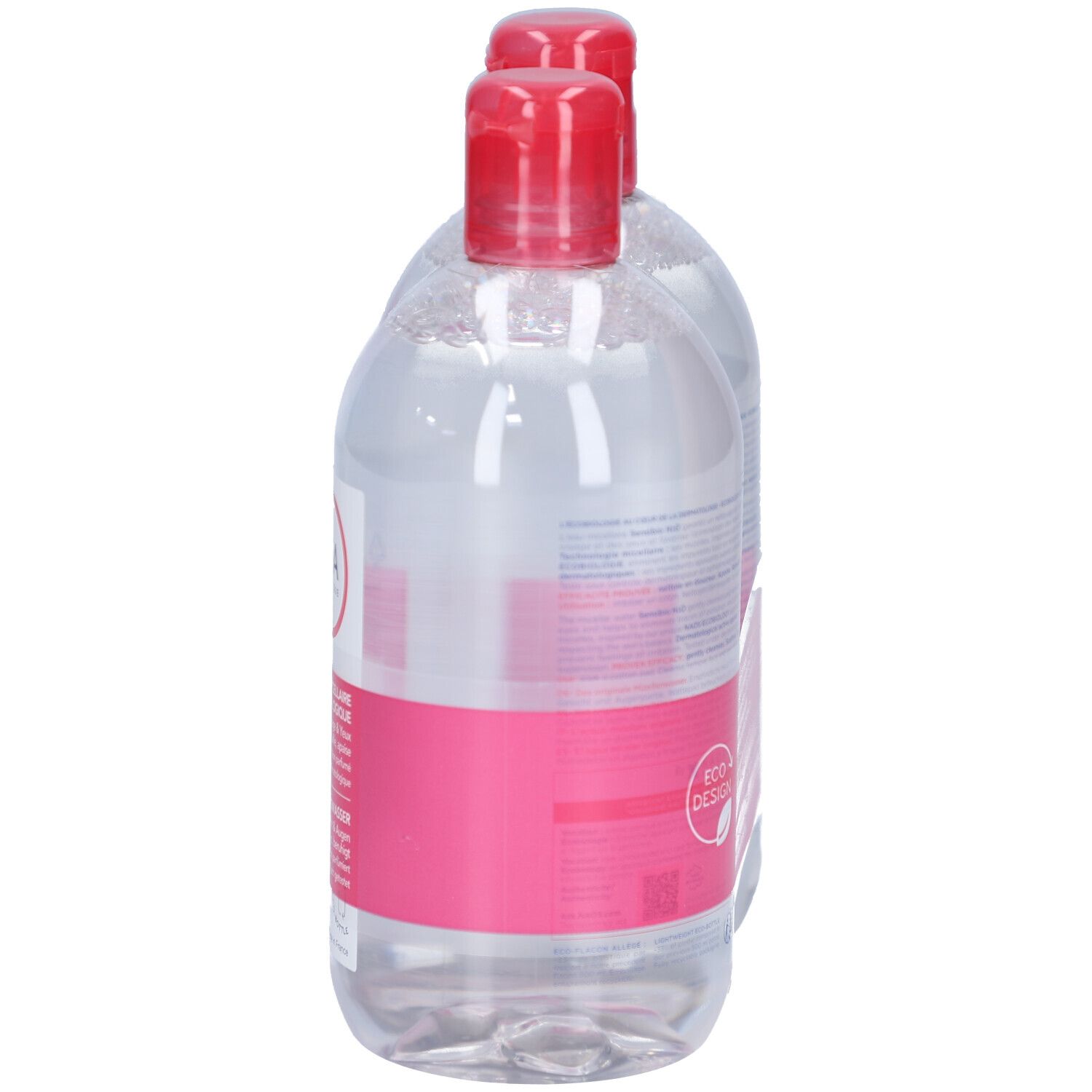 Zwei Flaschen mit rotem Deckel. Aufkleber mit BIODERMA-Logo und Eco Design. Rückseite mit Text.