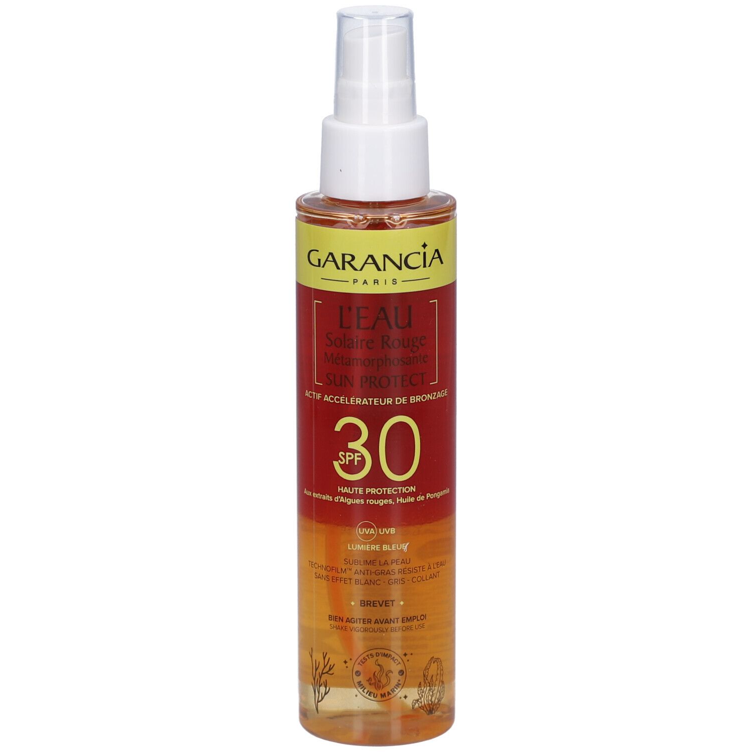 GARANCIA L'Eau Solaire Rouge Métamorphosante Sun Protect SPF30. Sprayflasche. Rote und gelbe Etiketten. Sichtbare Produktinformationen.