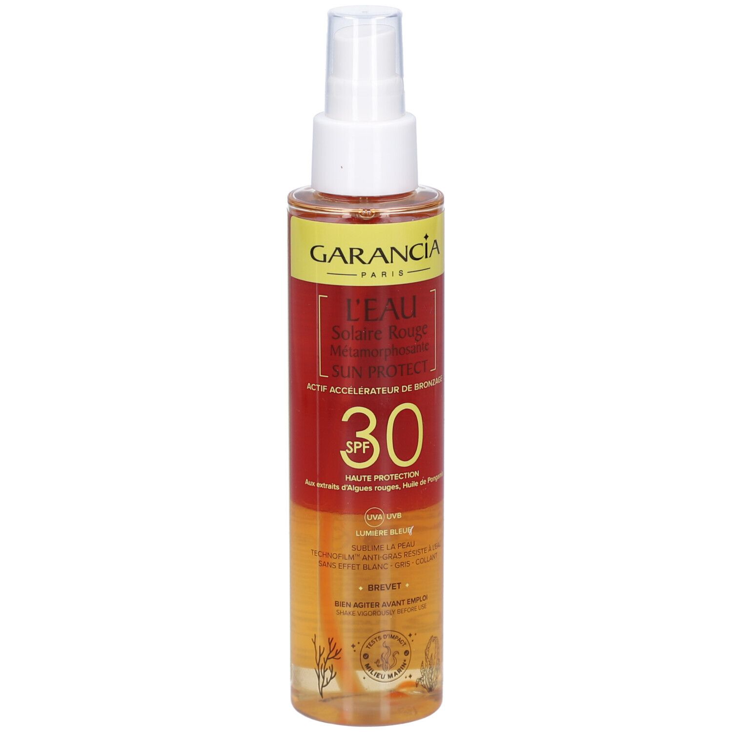 GARANCIA L'Eau Solaire Rouge Métamorphosante Sun Protect SPF30. Sprayflasche. Rote und gelbe Etiketten. Sichtbare Produktinformationen.