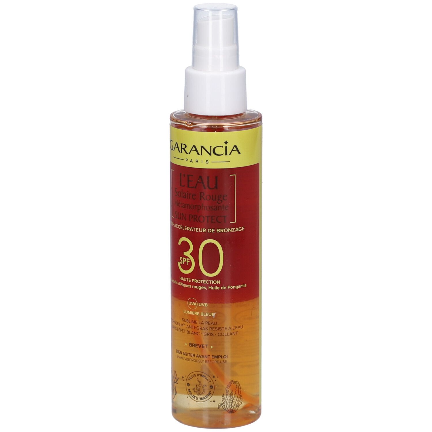 GARANCIA L'Eau Solaire Rouge Métamorphosante Sun Protect SPF30. Sprayflasche. Rote und gelbe Etiketten. Sichtbare Produktinformationen.