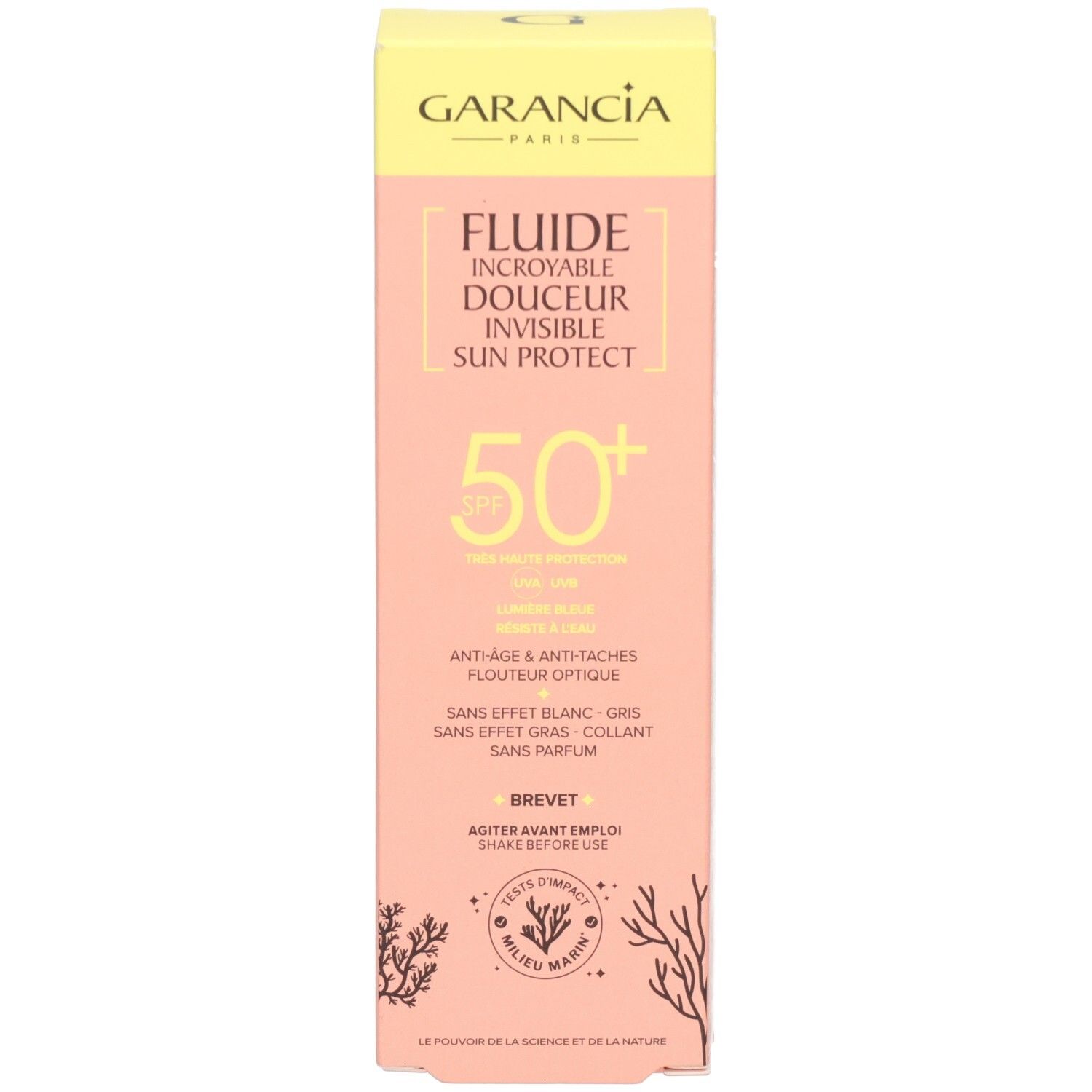 Face avant de la boîte de fluide solaire Garancia SPF50+. Carton jaune et rose avec informations produit et SPF50+.