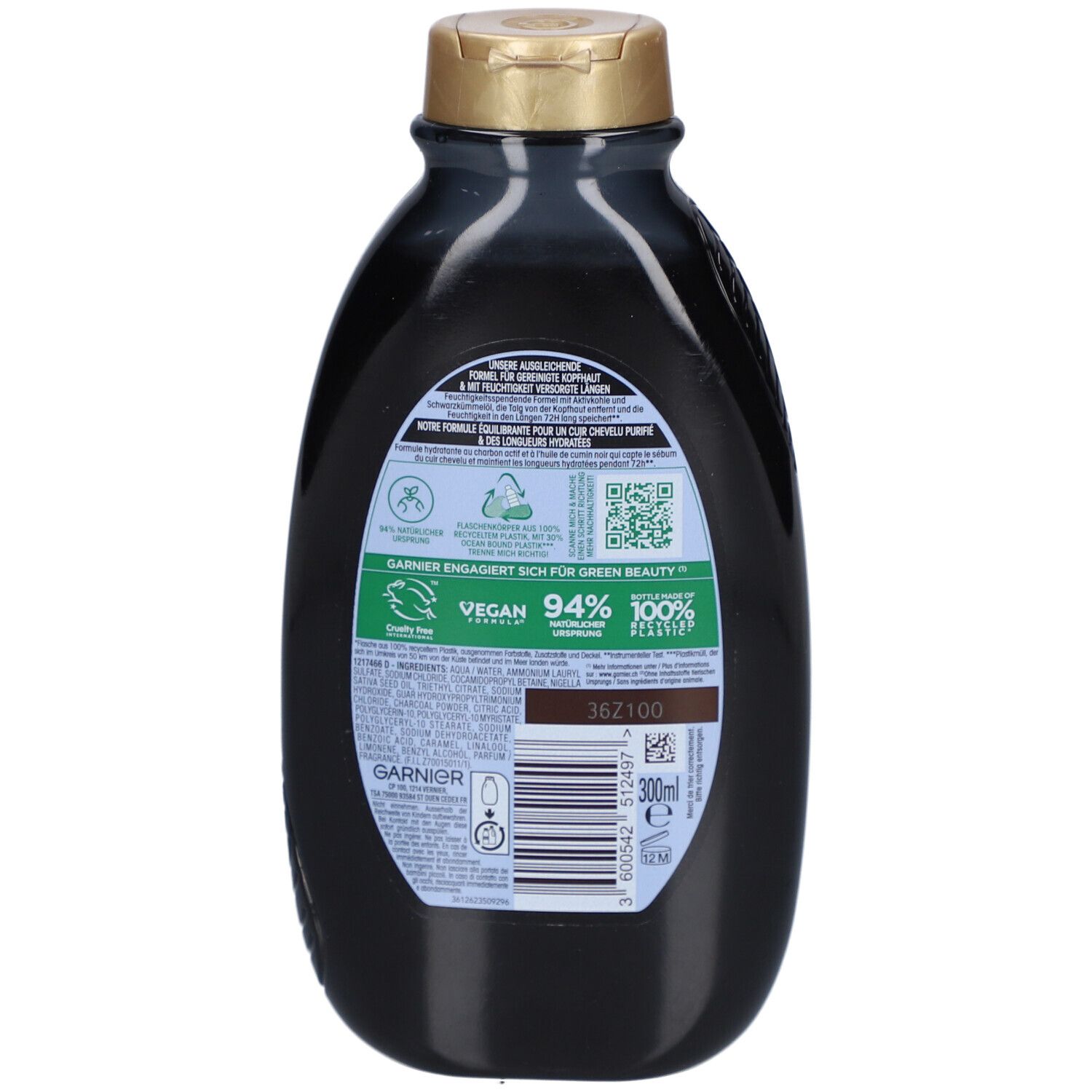 Dos du flacon de shampooing. Texte: GARNIER, Vegan, 94% d'origine naturelle, 100% plastique recyclé. Code QR et code-barres.
