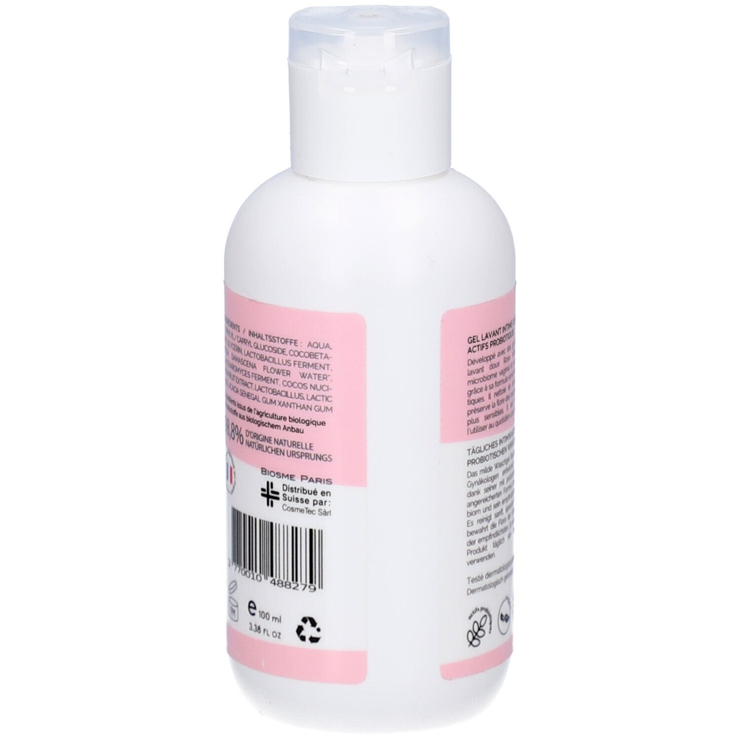 Dos du flacon. Étiquette avec ingrédients, informations du fabricant et code-barres. Texte en plusieurs langues.